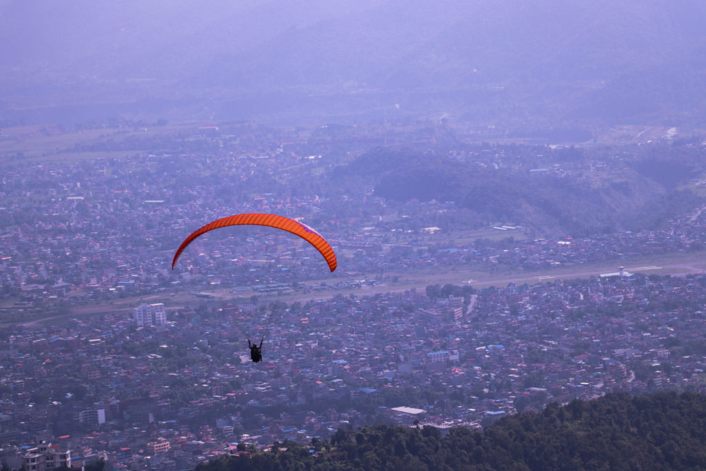 Rich results on Google's SERP while searching for 'paragliding in pokhara'